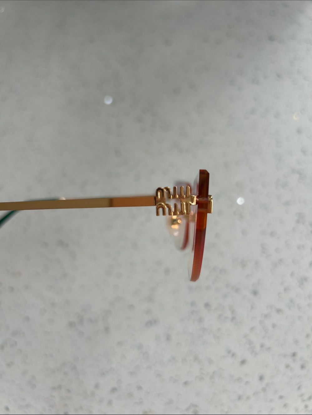 Miu Miu Pink Gradient Rimless Sunglasses with Gold Temples and Green Tips - Picture 3 of 9